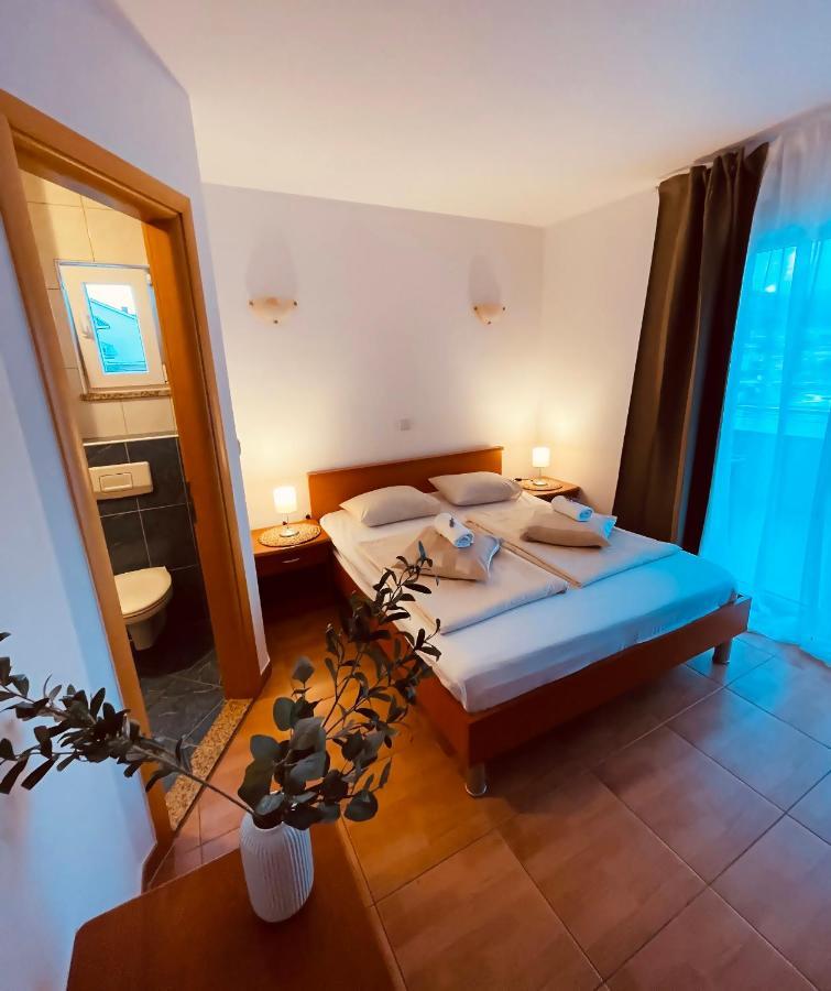 Apartments Stina Seget Vranjica Bagian luar foto